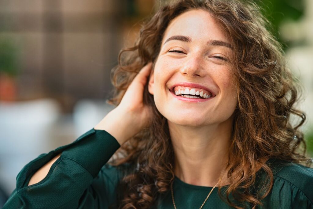 A laughing woman with beautiful teeth